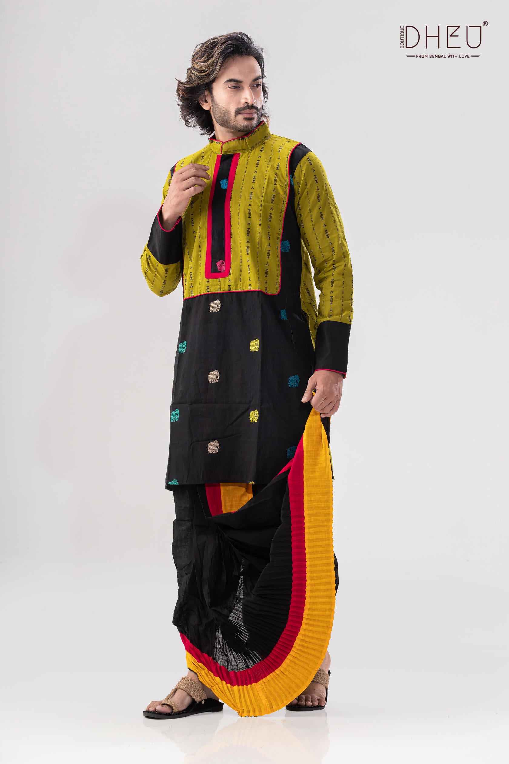 GOLD RAW SILK SHORT SHERWANI WITH A SATIN KURTA AND DHOTI WITH AN OPTIONAL WORKED STOLE AND JUTIS